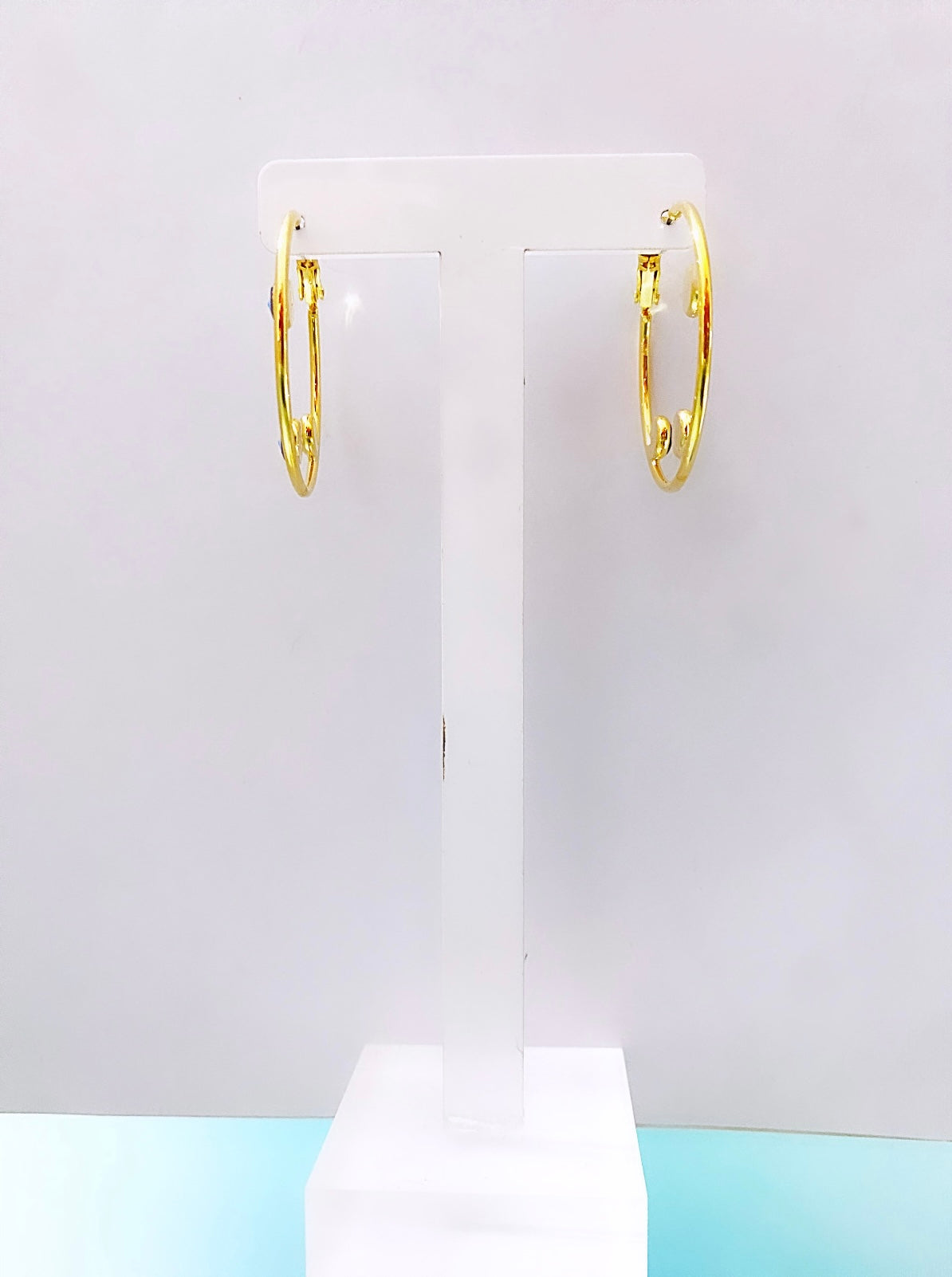 Lucky eyes hoop earring