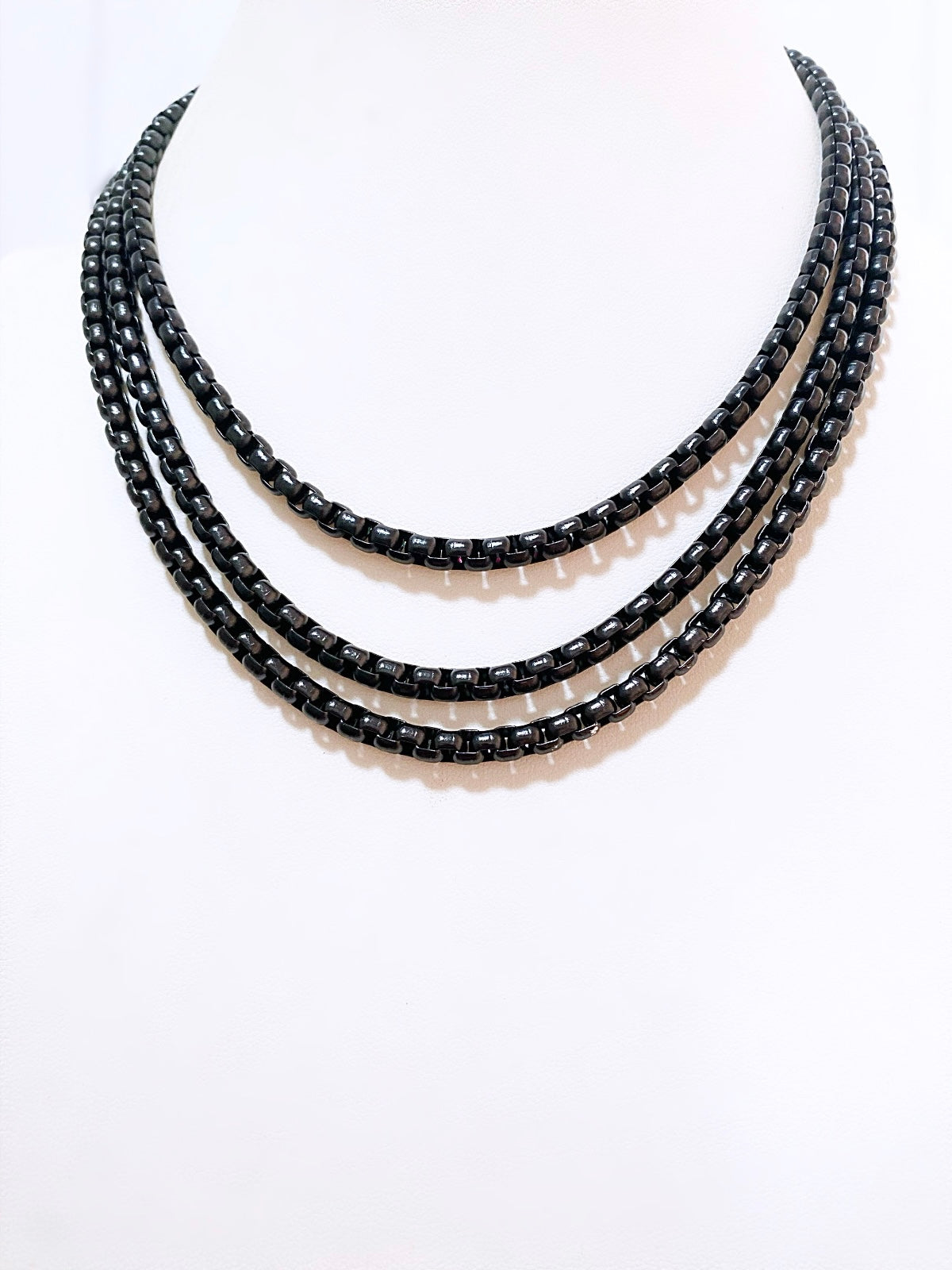 Black triple chain necklace