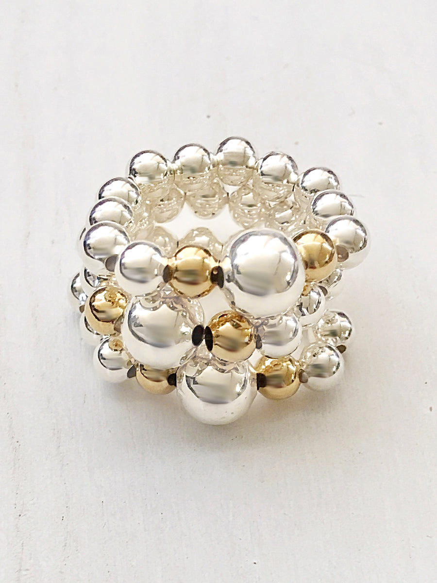 Silver and two tones ball elastic rings each